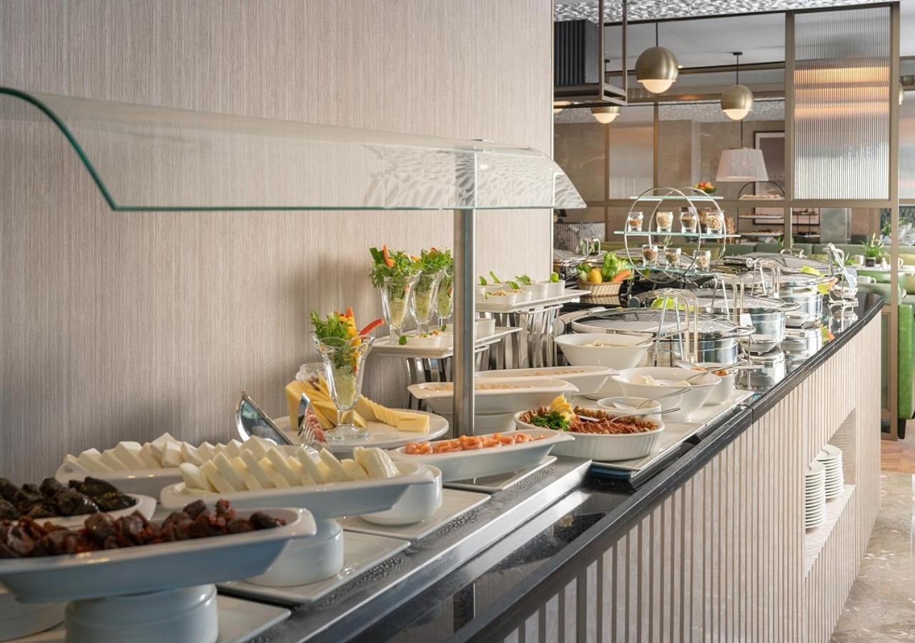 Joudyan Red Sea Mall Jeddah By Elaf Exterior photo A buffet at a hotel